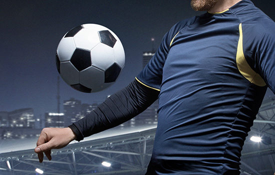 Man chests football to promote leading football insurance broker Full-time Cover