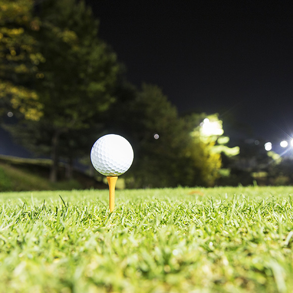 Golf ball on tee to promote leading golf insurance broker Full-time Cover