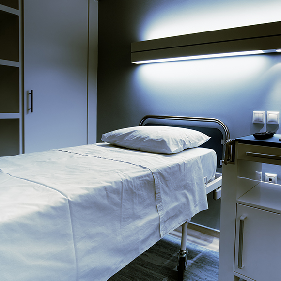 Empty hospital bed to promote leading health and life insurance brokers Full Time Cover