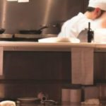 Commercial kitchen in operation to promote leading hotel insurance brokers full time cover