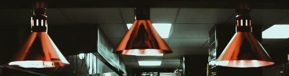 Commercial kitchen in operation to promote leading hotel insurance brokers full time cover