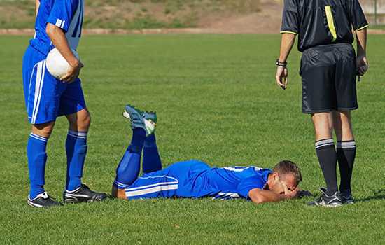 Footballer visibly injured on pitch to promote Full Time Cover's Sports Accident Insurance