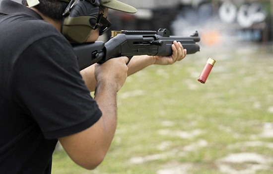 Male shooting an air rifle mid-shot to promote Full Time Cover's Sports Shooting Insurance