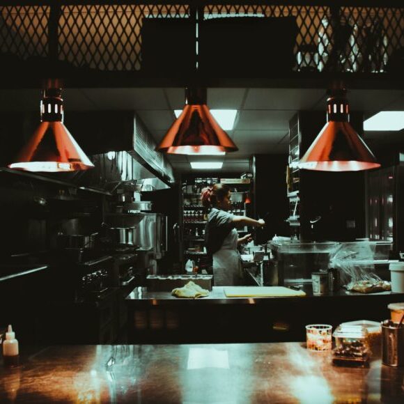 Commercial kitchen in operation to promote leading hotel insurance brokers full time cover